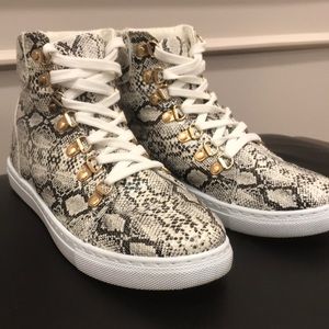 Snakeskin sneakers.